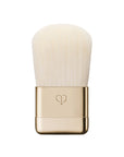 Clé de Peau Beauté: The Luminizing Face Enhancer Brush